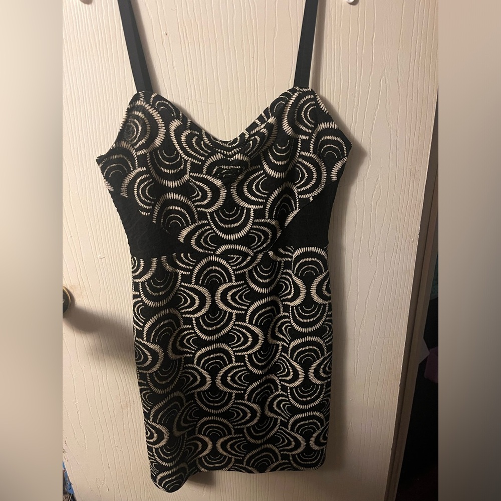 Dress by Free People. Black and Cream color. Size L.